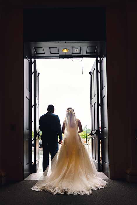 Bride exit the church front door