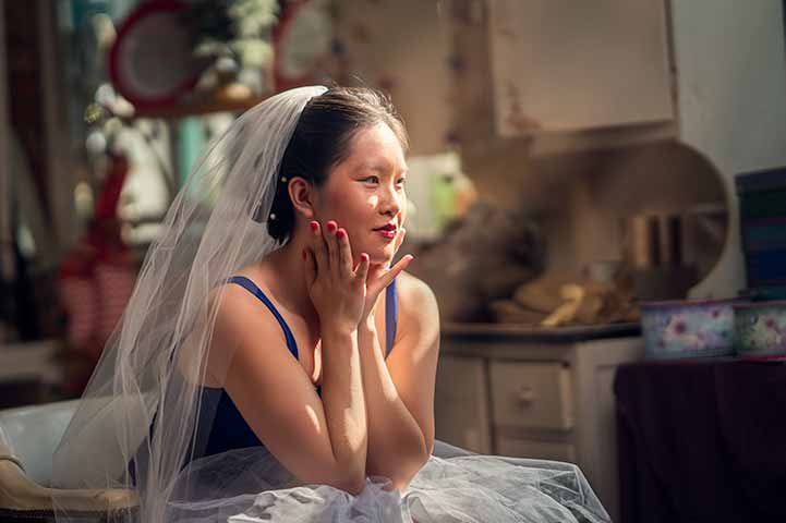 Bride looking up the Window