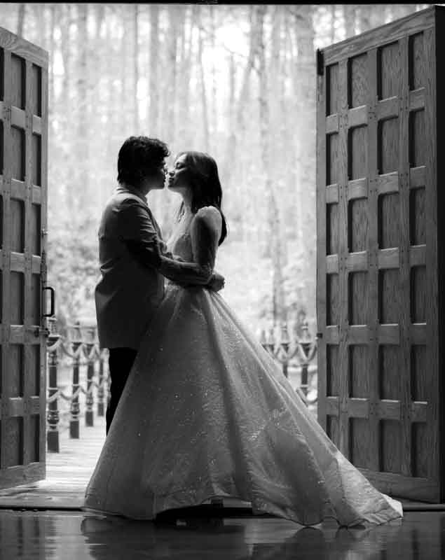 Bride sit on wedding dress have fun